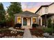 Charming home with a well-manicured front yard and inviting walkway, perfect curb appeal at 3842 Zenobia St, Denver, CO 80212
