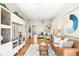 Bright living room with hardwood floors, stylish decor, and a comfortable seating area at 3842 Zenobia St, Denver, CO 80212