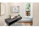 Inviting home office space with natural light and a sleek, minimalist desk at 3842 Zenobia St, Denver, CO 80212