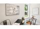 Charming office area with a modern desk, artwork, and a large window with views at 3842 Zenobia St, Denver, CO 80212