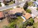 An aerial view of the home shows a large yard, wooden deck, detached garage, and mature trees at 6500 S Downing St, Centennial, CO 80121