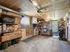 Unfinished basement with ample storage space, concrete floor, and exterior access at 6500 S Downing St, Centennial, CO 80121