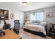 Comfortable bedroom setup with an adjacent office space at 6500 S Downing St, Centennial, CO 80121