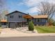 Charming two-story home with landscaped front yard, covered porch, and lovely curb appeal at 6500 S Downing St, Centennial, CO 80121