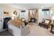 Inviting living room with brick fireplace, plush seating, and natural light at 6500 S Downing St, Centennial, CO 80121