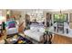 Spacious living room with an open floor plan to the kitchen and dining area at 6500 S Downing St, Centennial, CO 80121