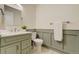 Charming half-bathroom with a marble countertop and modern fixtures at 9967 Lane St, Thornton, CO 80260