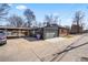 Back of home showing the garage, carport and long driveway leading out to the street at 2731 W 42Nd Ave, Denver, CO 80211