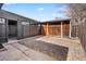 View of the gravel area in the backyard and wooden fence and shed at 2731 W 42Nd Ave, Denver, CO 80211