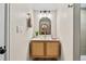 Stylish half-bathroom with a vessel sink, decorative mirror, and modern fixtures at 2731 W 42Nd Ave, Denver, CO 80211