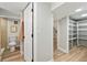 Open doorway in bathroom leads to the shower and features a view of the toilet and closet at 2731 W 42Nd Ave, Denver, CO 80211