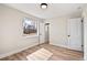 Clean bedroom space with lots of natural light, featuring wood-look vinyl plank flooring at 2731 W 42Nd Ave, Denver, CO 80211