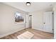 Bedroom with wood floors, natural light, white walls, and closet at 2731 W 42Nd Ave, Denver, CO 80211
