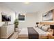 Modern bedroom with a comfortable bed, minimalist decor, and soft, neutral tones at 2731 W 42Nd Ave, Denver, CO 80211
