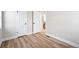 Spacious bedroom with wood floors, offering ample space and a walk-in closet at 2731 W 42Nd Ave, Denver, CO 80211