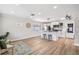 Bright, modern kitchen featuring white cabinets, stainless steel appliances, and a cozy breakfast bar at 2731 W 42Nd Ave, Denver, CO 80211