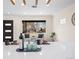 Bright kitchen with a large island, modern lighting, white countertops, and a view to the outside at 2731 W 42Nd Ave, Denver, CO 80211