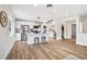 Bright, open kitchen with white cabinets, stainless steel appliances, and a large island at 2731 W 42Nd Ave, Denver, CO 80211