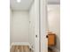 A tidy laundry room with modern fixtures and wood-style flooring, offering a practical space at 2731 W 42Nd Ave, Denver, CO 80211