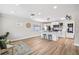 Spacious living area with an open floor plan, modern kitchen with island, and ample natural light, perfect for entertaining at 2731 W 42Nd Ave, Denver, CO 80211