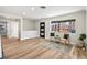 Bright living space featuring wood floors, contemporary furnishings, and a view of the neighborhood at 2731 W 42Nd Ave, Denver, CO 80211