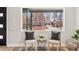 Cozy living room features a large window with neighborhood views and comfortable seating area at 2731 W 42Nd Ave, Denver, CO 80211