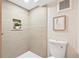 Modern shower featuring tiled walls, a niche for storage, and updated fixtures at 2731 W 42Nd Ave, Denver, CO 80211