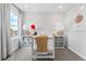 Charming Bedroom designed with playful wallpaper, a crib and soft lighting creating a delightful atmosphere for a baby at 2108 Chambers Rd, Brighton, CO 80601
