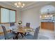Dining room featuring a chandelier and hardwood floors at 5284 Taft Ct, Arvada, CO 80002