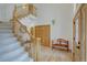 Bright foyer with hardwood floors, staircase, and closet at 5284 Taft Ct, Arvada, CO 80002