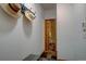 Hallway with slate tile floor and convenient access to the bathroom at 5284 Taft Ct, Arvada, CO 80002