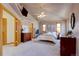 Spacious main bedroom with a fireplace, ceiling fan and tv at 5284 Taft Ct, Arvada, CO 80002