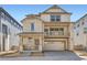 Beautiful two-story home with stone accents, covered porch and balcony at 7213 Waterleaf Trl, Littleton, CO 80125