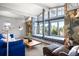 Comfortable sitting area with built-in bench seating and large windows offering scenic views at 6211 E Orchard Dr, Greenwood Village, CO 80111