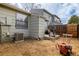 This property features a spacious backyard with patio and privacy fence at 8180 Washington St # 126, Denver, CO 80229