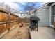 Enclosed backyard with a patio and grill, perfect for outdoor entertaining at 8180 Washington St # 126, Denver, CO 80229