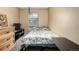 Bedroom featuring neutral walls, a window, carpet, and a bed at 8180 Washington St # 126, Denver, CO 80229