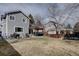 Spacious backyard with a patio featuring a pergola, outdoor seating, and a grill at 2888 Deer Creek Trl, Highlands Ranch, CO 80129