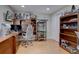 Home office featuring a desk, shelving, and ample storage at 2888 Deer Creek Trl, Highlands Ranch, CO 80129