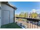 View of a parking lot from a balcony with an outdoor closet at 2575 S Syracuse Way # M307, Denver, CO 80231