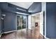 Bedroom with a private balcony and ensuite bathroom, offering a peaceful retreat at 2575 S Syracuse Way # M307, Denver, CO 80231