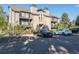 A lovely condo building with stone accents and outdoor balconies for each unit at 2575 S Syracuse Way # M307, Denver, CO 80231