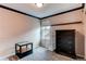 Cozy bedroom featuring neutral walls, carpet, and a small table near a window at 6647 Lynx Cv, Lone Tree, CO 80124