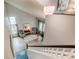 Bright living room with hardwood floors, comfortable seating, and natural light from large windows at 6647 Lynx Cv, Lone Tree, CO 80124
