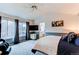 Serene primary bedroom with cozy carpet, large windows, and a peaceful atmosphere at 6647 Lynx Cv, Lone Tree, CO 80124