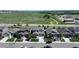 Aerial view of a neighborhood showcasing well-maintained homes, landscaped yards, and community amenities at 6193 Saddle Bow Ave, Parker, CO 80134