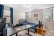 Well-lit bedroom includes a cozy bed and an abundance of natural light at 6193 Saddle Bow Ave, Parker, CO 80134