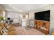 Comfortable living room features neutral colors, a TV, and stylish furnishings at 6193 Saddle Bow Ave, Parker, CO 80134