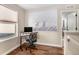 Bright and spacious office features hard flooring and a modern desk at 6193 Saddle Bow Ave, Parker, CO 80134