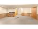 Expansive basement with a wet bar and ample room for entertainment at 8879 Apache Plume Dr, Parker, CO 80134